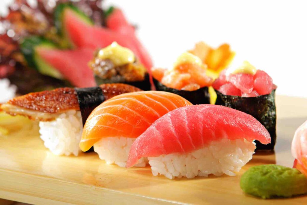 You'll want to taste this Hawaii sushi. Image of Sushi Set: Salmon, Conger and Tuna Sushi with Salad Leaf