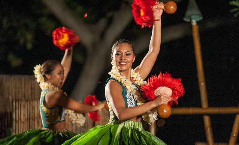 Find out the best Big Island luau experiences to check out. Image of hula dancers at the Royal Kona Resort luau