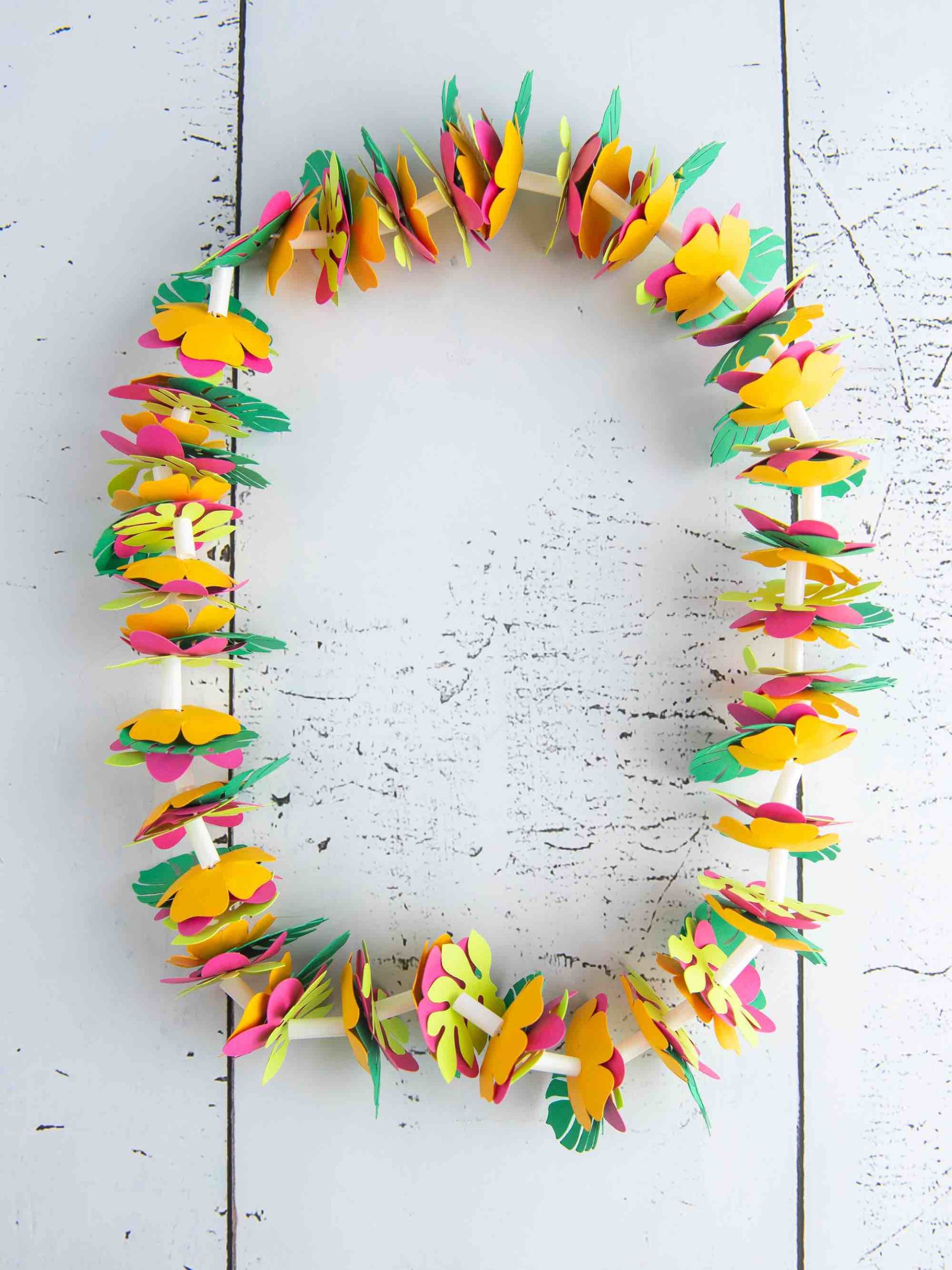 Learn how to make a Hawaiian paper lei by top Hawaii blog Hawaii Travel with Kids.