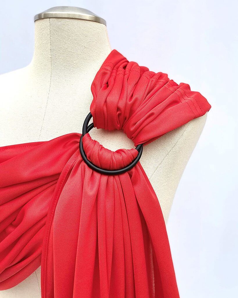 Image of a red Beachfront baby ring sling for water.