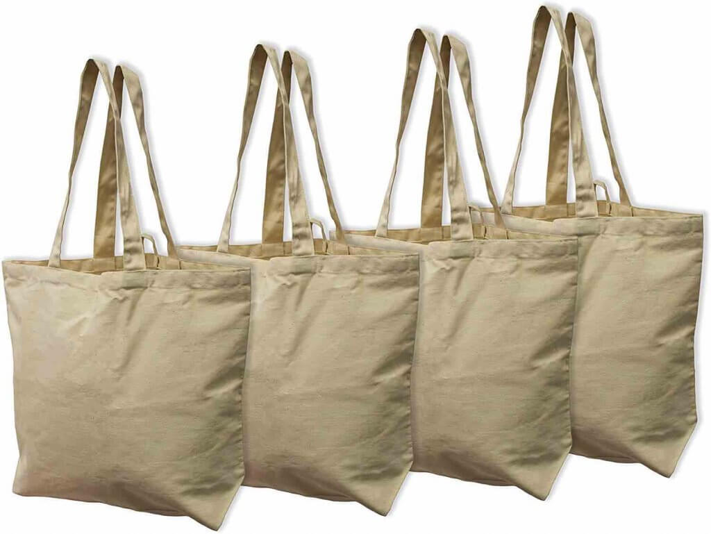 Another essential zero waste Hawaii travel item are reusable bags, since plastic bags are banned in Hawaii. Image of 4 brown organic bags.