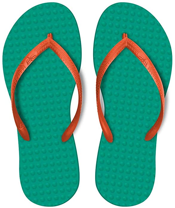 Help save the planet by adding these eco friendly flip flops to your Hawaii packing list. Image of green and orange flip flops.