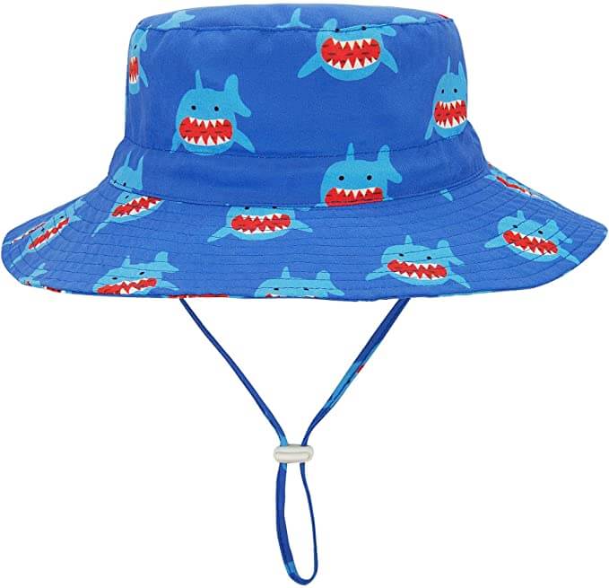 And SPF sun hat is one of the best Hawaii baby beach items to pack. Image of a shark print bucket hat for babies.