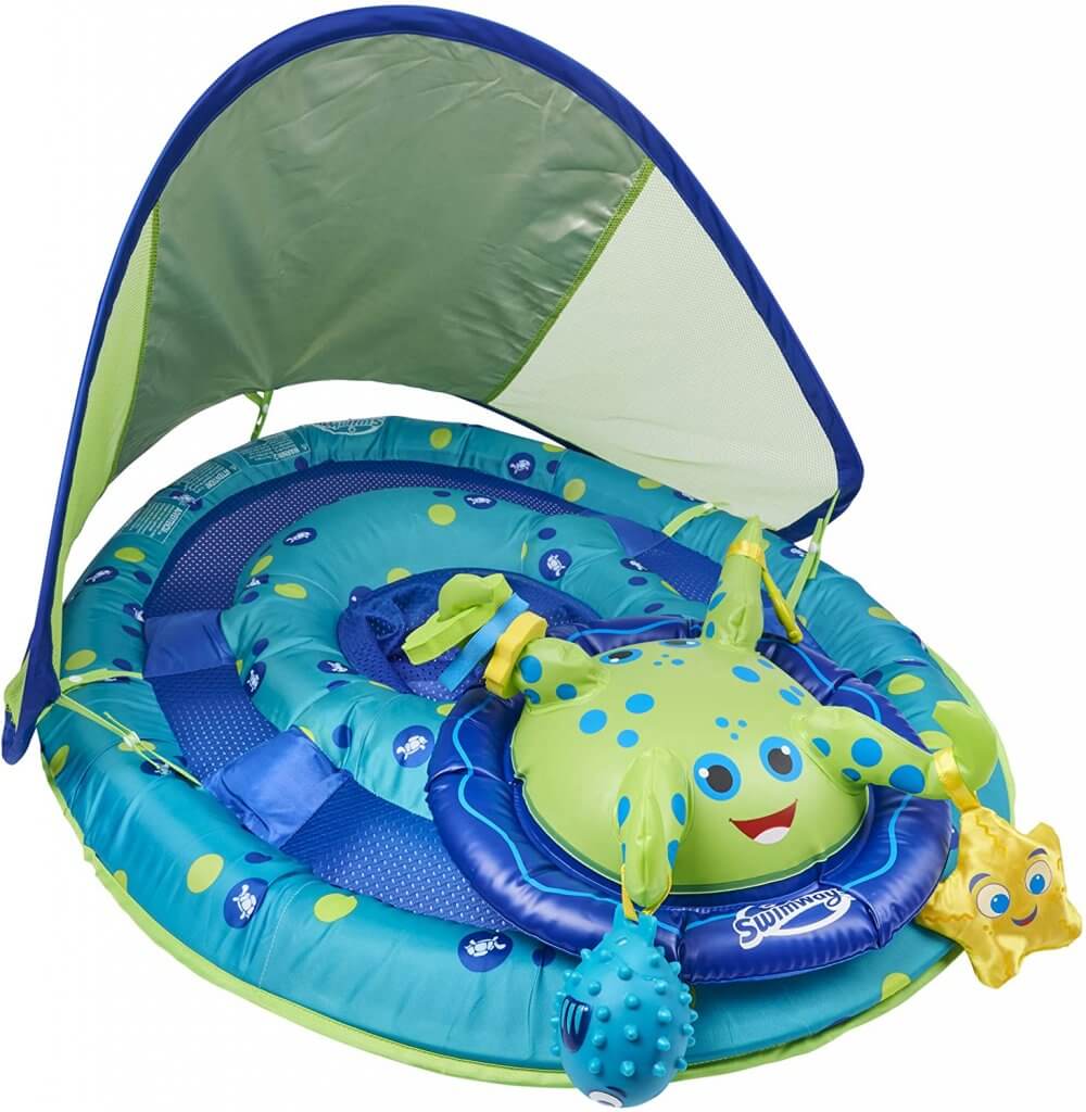 This is one of the cutest swim floats for babies because it has toys attached to it. Image of a blue and green baby pool float with baby toys attached.