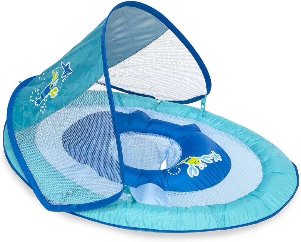 A decent baby swim float is one of the most imporant beach necessities for baby. Image of a SwimWays baby swim float with canopy.