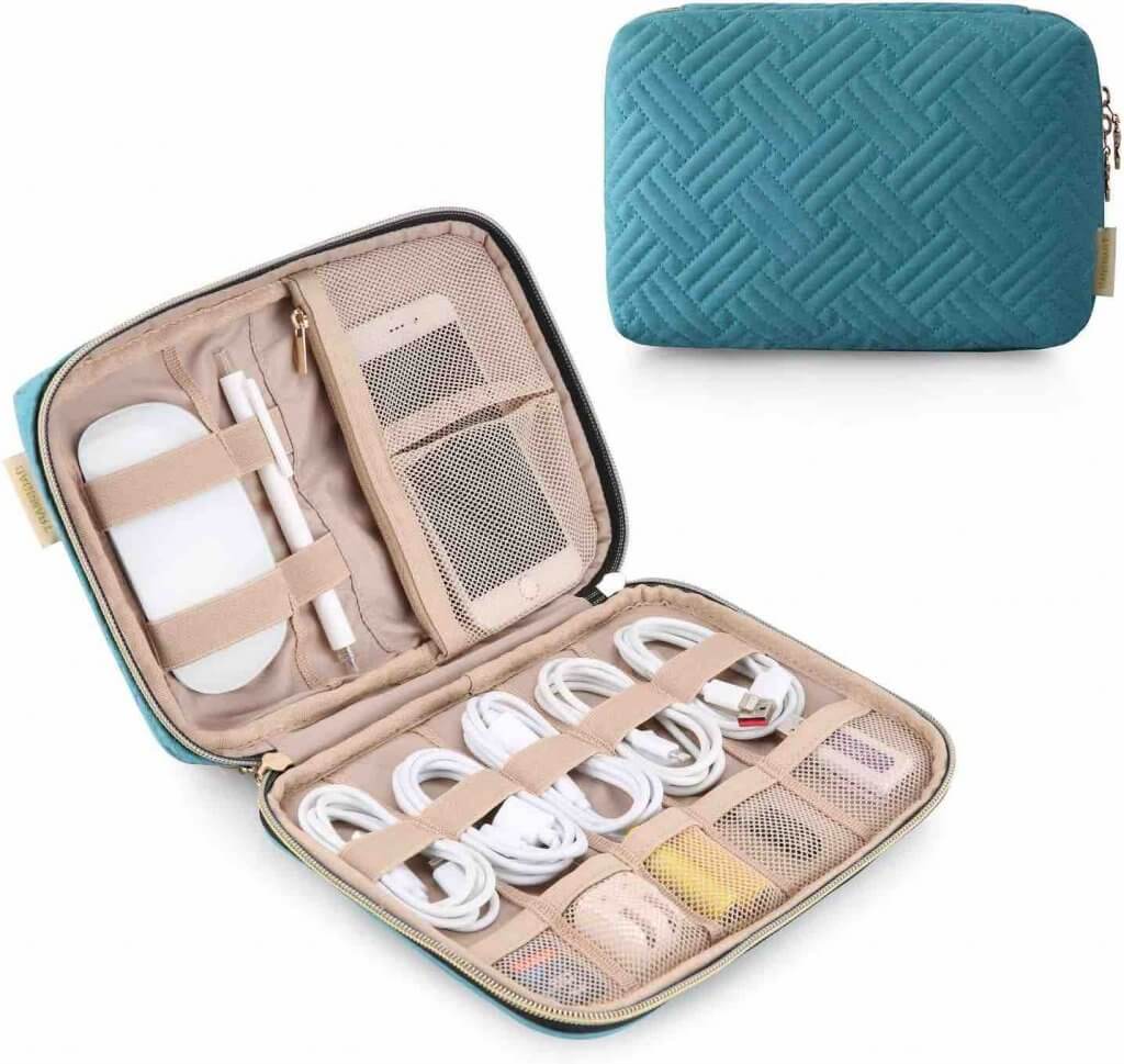 Add this electronic organizer to your Hawaii packing list to keep all your charging cables organized. Image of a blue and rose gold electronic organizer pouch.