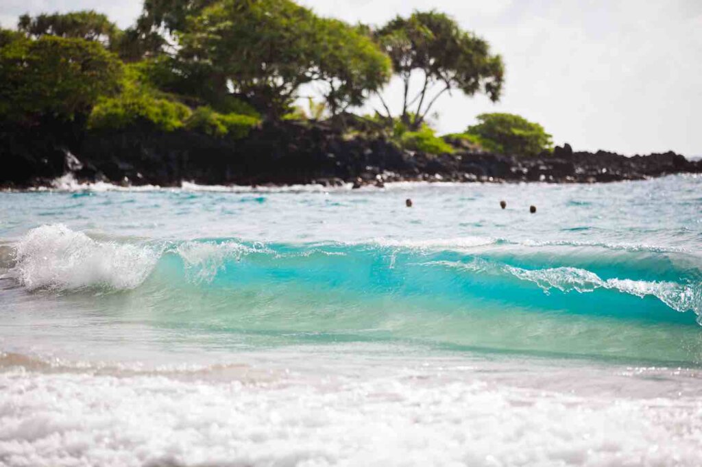 Another awesome Hana road stop is Hamoa Beach. Image of Hamoa Beach in Hana Maui. Photo credit: Hawaii Tourism Authority/Tor Johnson 