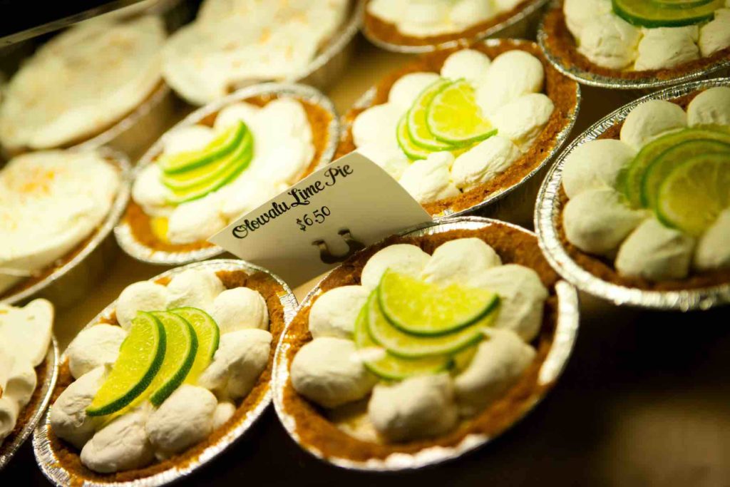 Find out the best Maui bakeries recommended by top Hawaii blog Hawaii Travel with Kids. Image of a bunch of mini key lime pies.