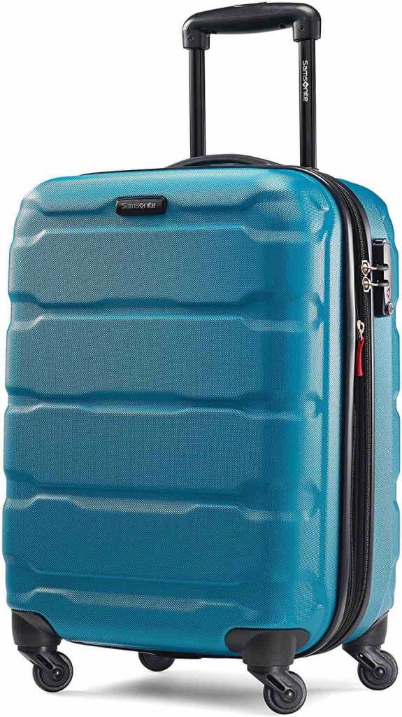 This is one of the best carry on rolling suitcases. Image of a blue rolling suitcase.