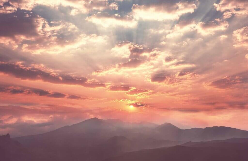 Find out how to see sunrise at Haleakala National Park by top Hawaii blog Hawaii Travel with Kids. Image of Beautiful sunrise scene on Haleakala volcano, Maui island, Hawaii