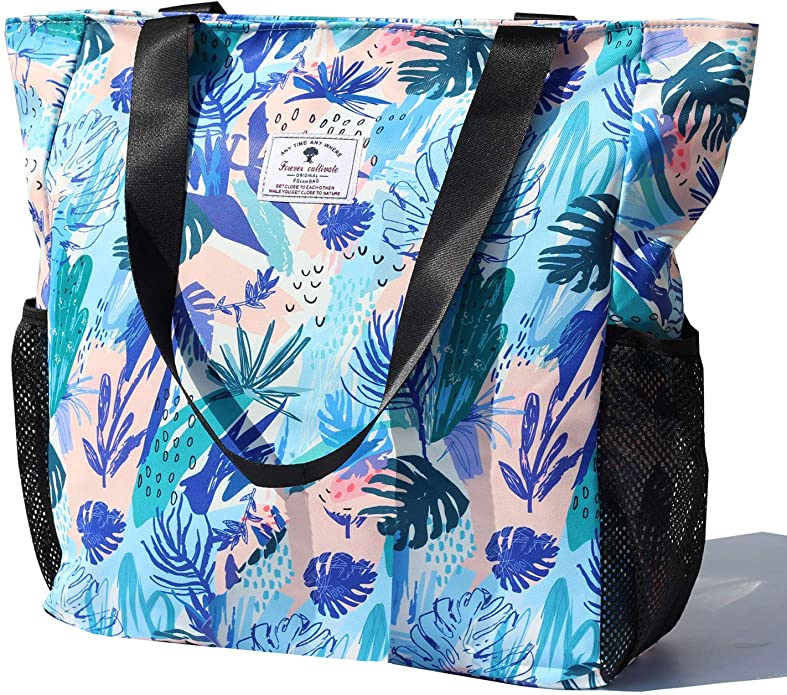 Be sure to pack a beach bag for Hawaii. Image of a blue and pink tropical beach bag.