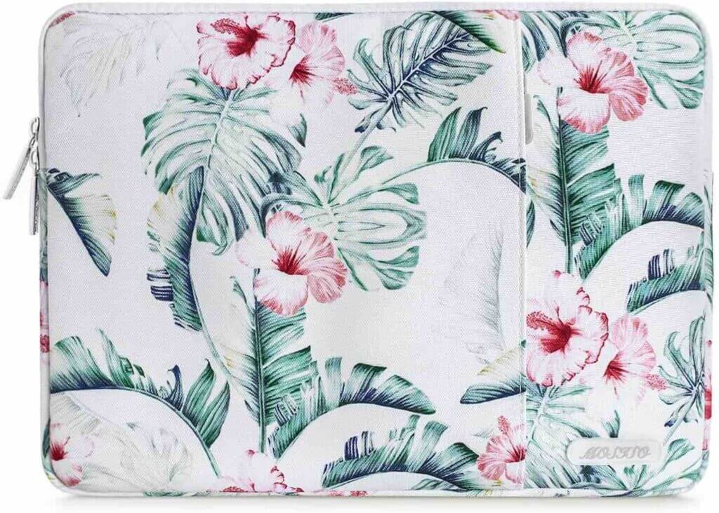 I always put my laptop in a laptop sleeve like this in my Hawaii carry on bag. Perfect addition to a Kauai packing list. Image of a tropical print laptop case.