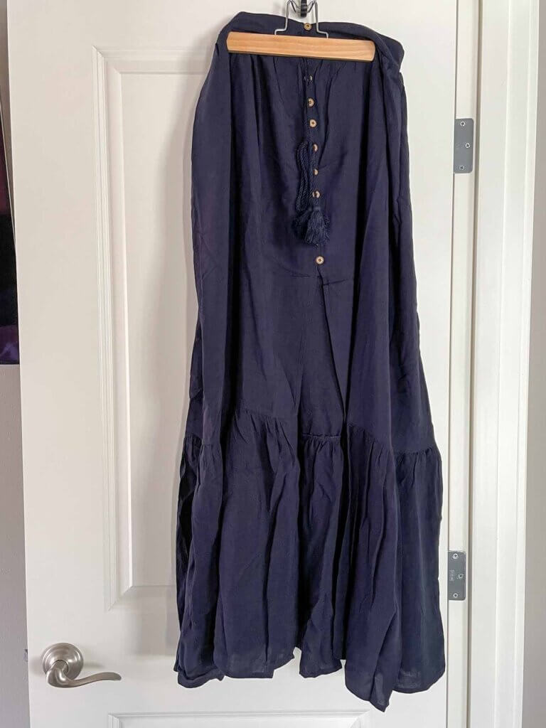 Image of a navy boho chic tiered maxi skirt that came in a Wantable style box.