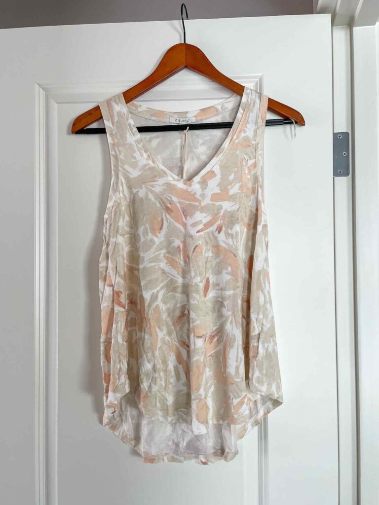 You'll definitely want to add some tank tops to your packing list for Hawaii. Image of a tan and orange tank top.