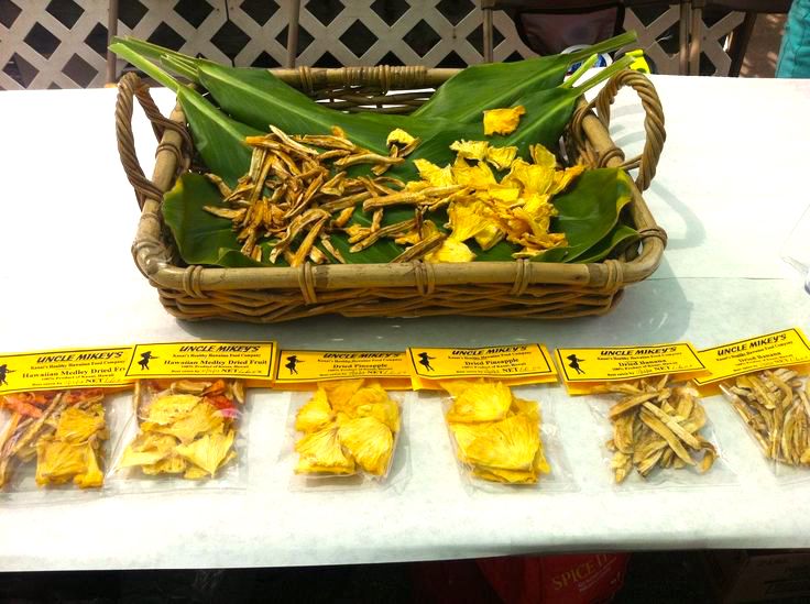 Try incredible Hawaiian dried fruit on this North Shore Kauai food tour. Image of a basket of dried pineapple and apple bananas.