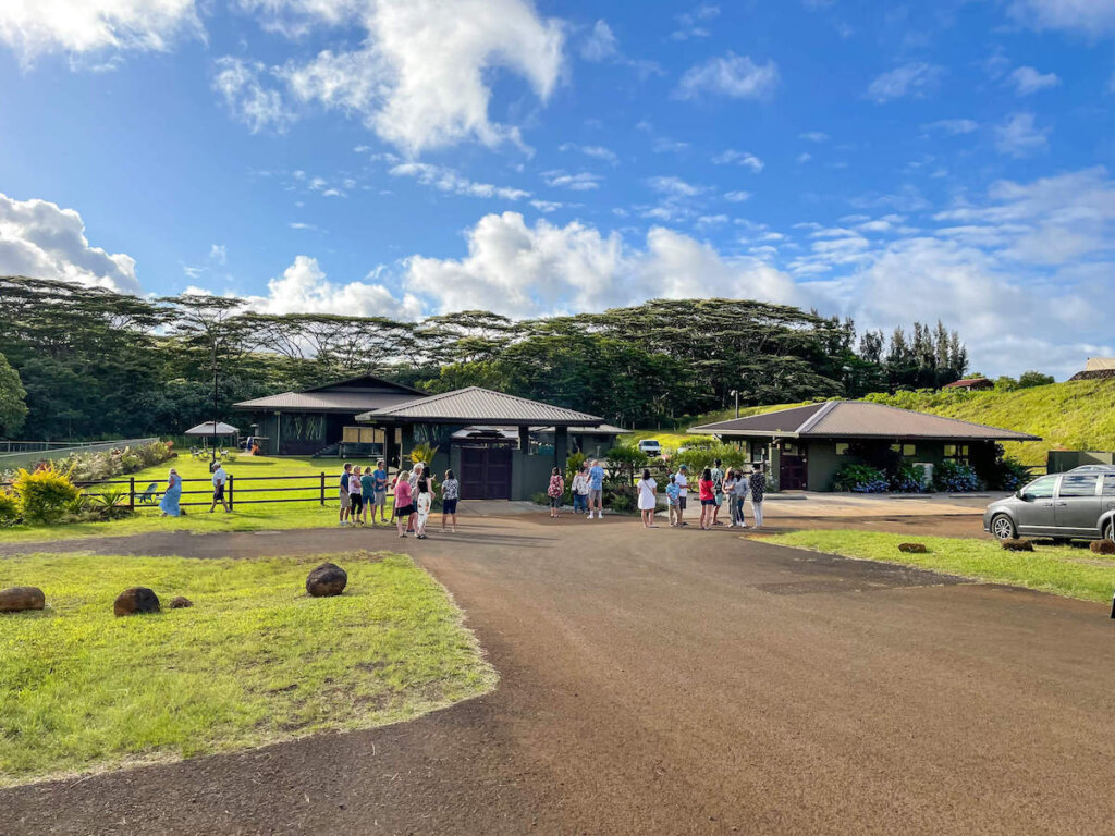 The Ahi Lele Fire Show takes place at the Anaina Hou Community Park pavilion in Kilauea Kauai. Image of a road leading to a park pavilion on Kauai.