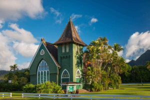 Find out the best things to do in Hanalei recommended by top Hawaii blog Hawaii Travel with Kids. Image of the Waioli Huiia Church in Hanalei.