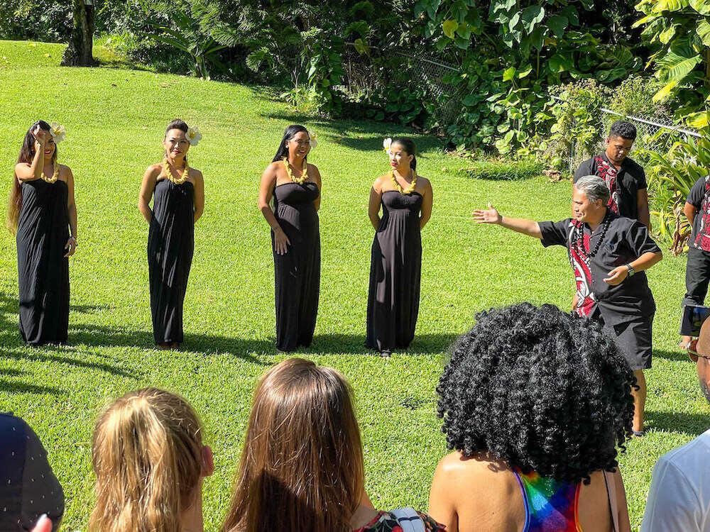 Experience Nutridge Luau is one of the best luaus on Oahu for families. Image of hula dancers at Nutridge Estate.