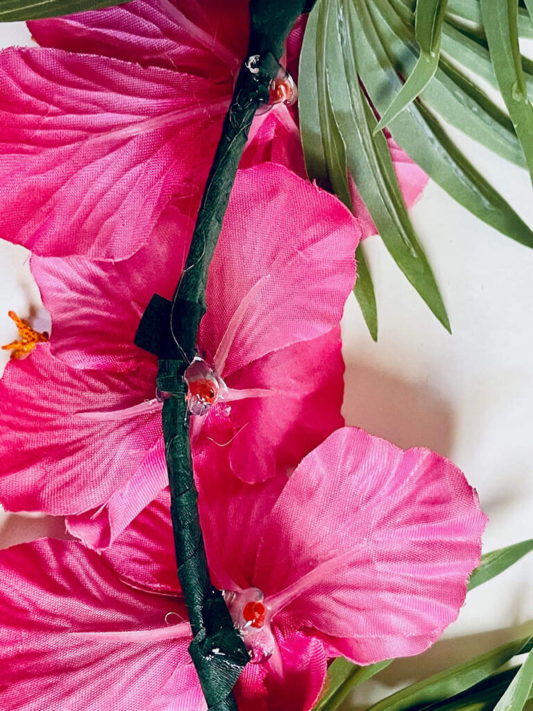 Image of pink flowers glued to a hoop wreath