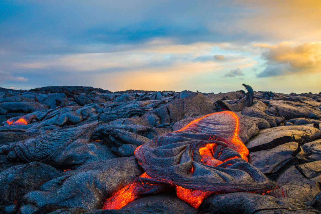 Want to see an active volcano in Hawaii? Head to Hawaii Volcanoes National Park on the Big Island. Image of lava at Hawaii Volcanoes National Park.