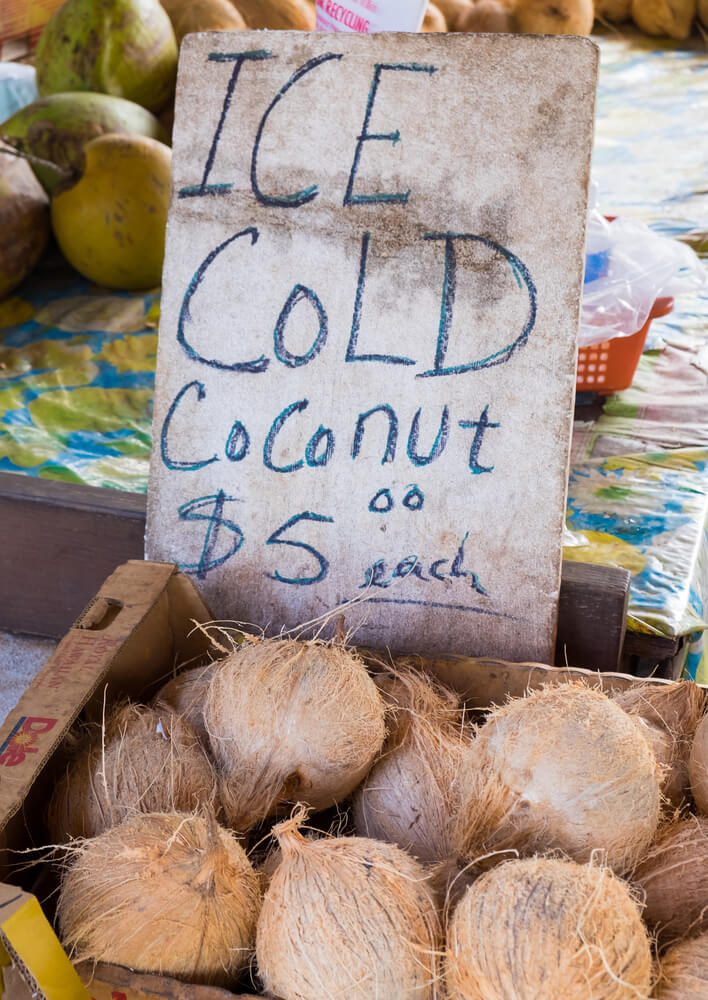 Get ice cold coconuts at a Hawaii farmers market on Oahu.