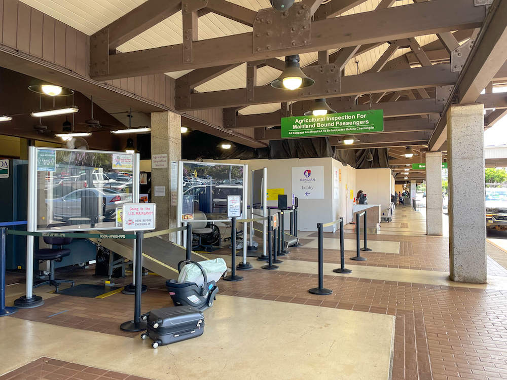 You will have to go through the agricultural inspection at the Lihue Airport if you are traveling to the Mainland. Image of the Hawaii agricultural inspection on Kauai.