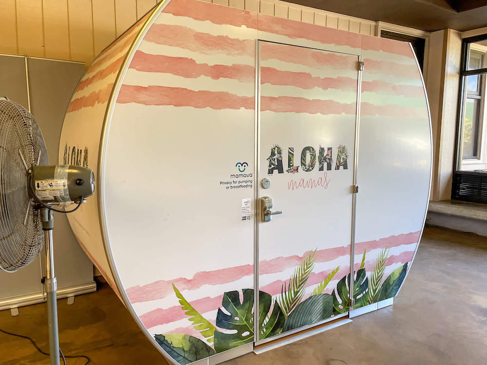 There is a nursing pod at the Lihue Airport for nursing moms. Image of a pine and white nursing pod at the Kauai airport.