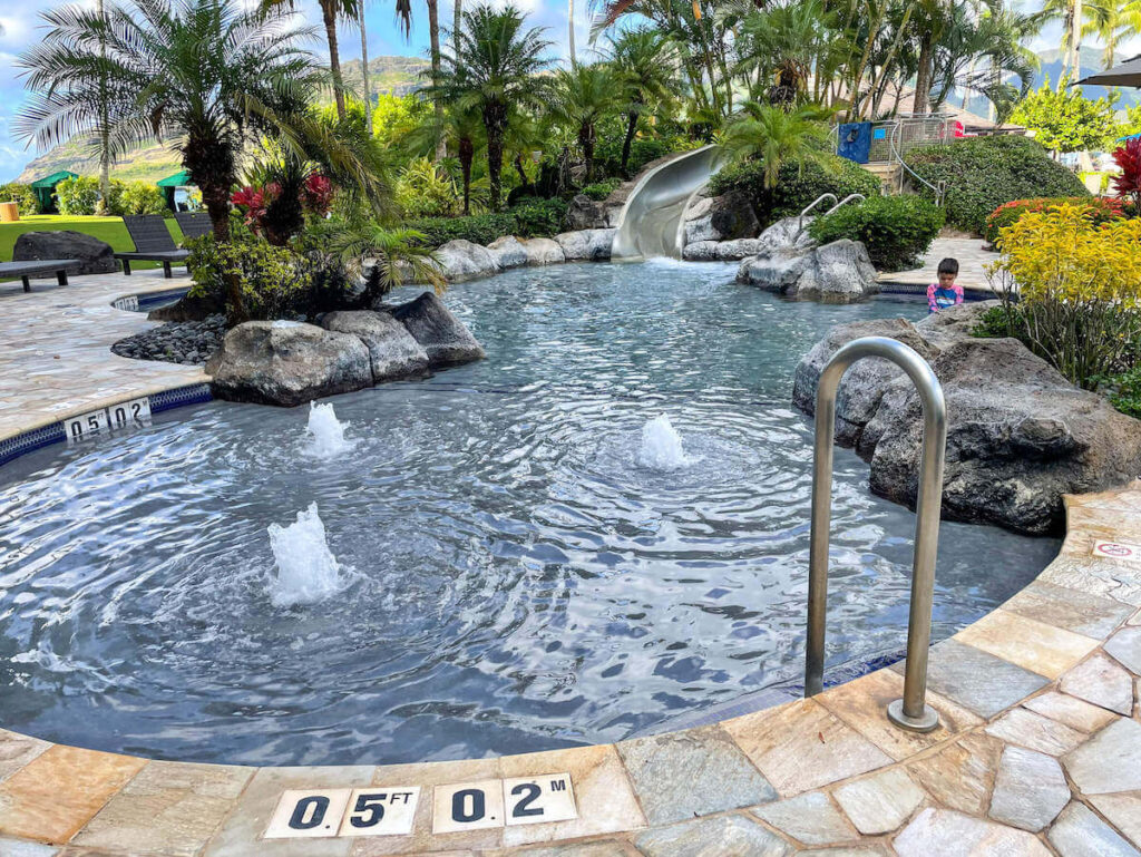 Where to stay on Kauai with kids: Royal Sonesta Kauai review. Image of the kiddie pool and water slide.