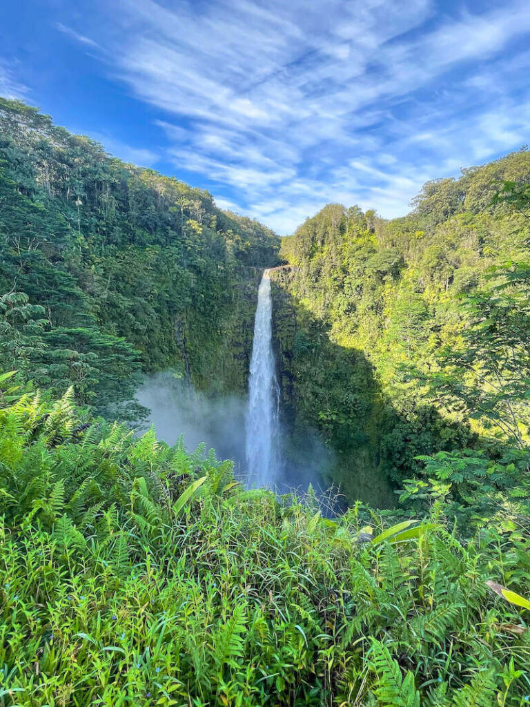 Image of a super tall waterfall on the Big Island of Hawaii.