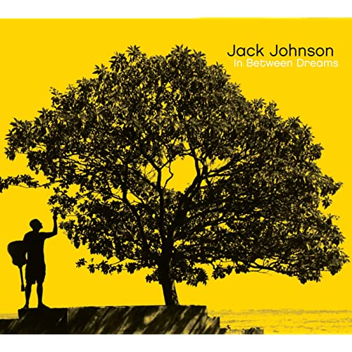 Image of a yellow album cover with a tree on it.