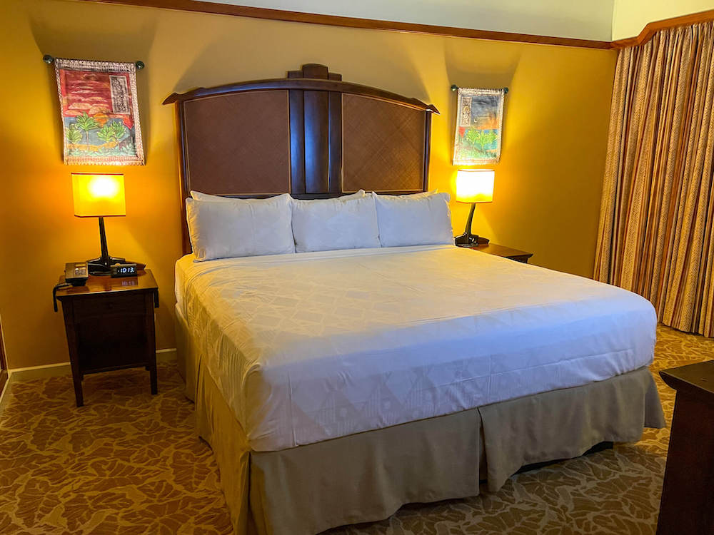 Image of a king size bed at Disney Aulani Resort in Hawaii.