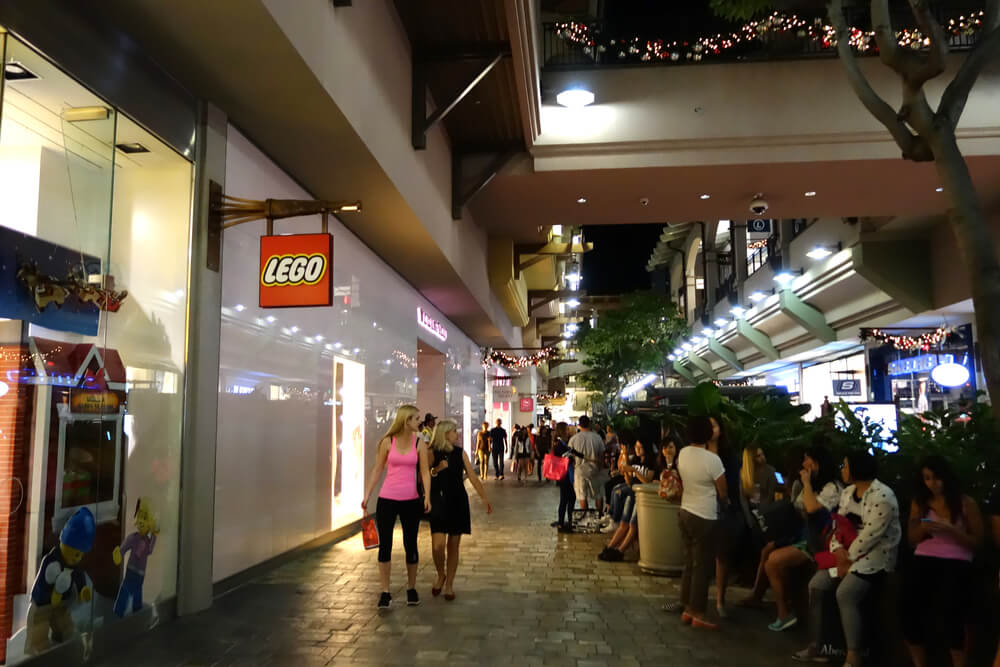 Image of the LEGO store at Ala Moana Center at night time.