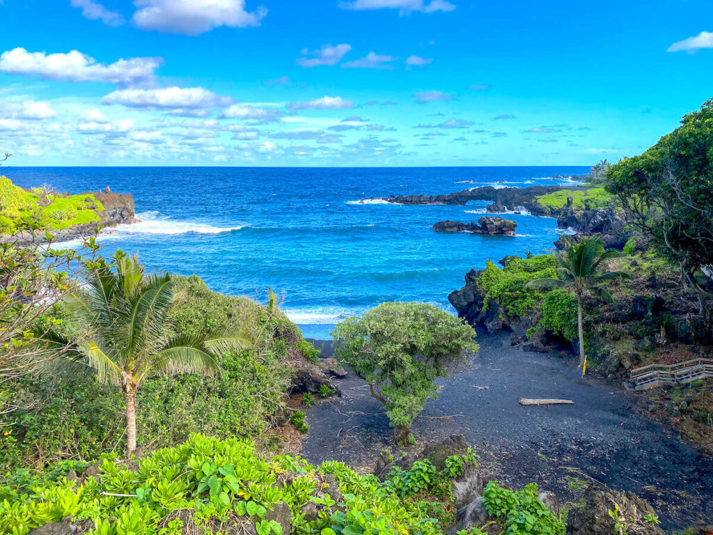 Image of a Maui black sand beach in Hana.