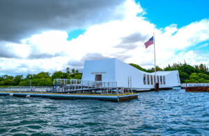 Find out how to get from Waikiki to Pearl Harbor by top Hawaii blog Hawaii Travel with Kids. Image of the USS Arizona Memorial at Pearl Harbor on Oahu.