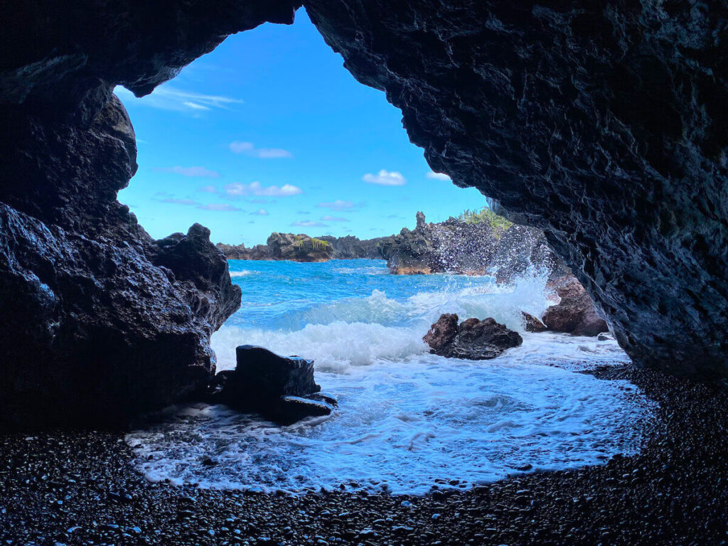 Image of a sea cave on Maui from inside the cave looking out on the Pacific Ocean.