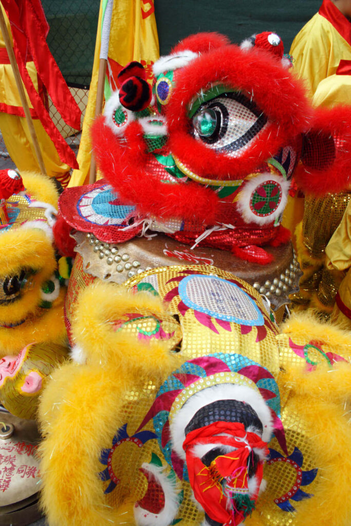 Image of a red and yellow Chinese lion as part of Chinese New Year festivities.