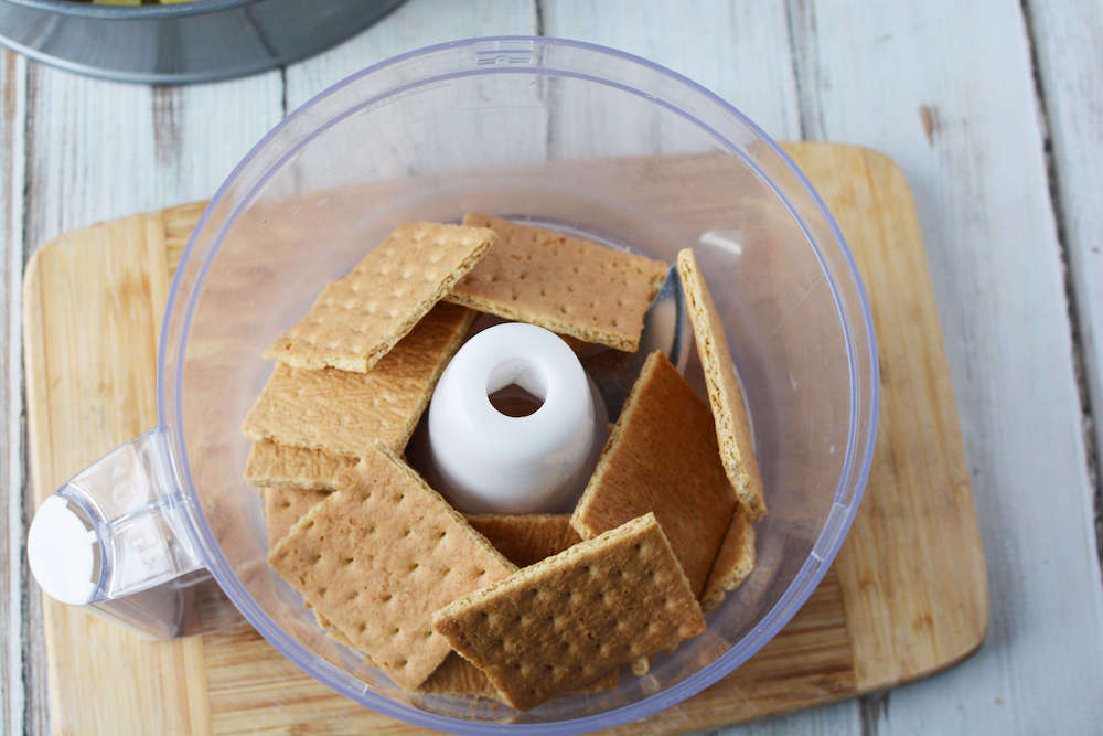 Image of graham crackers in a food processor.