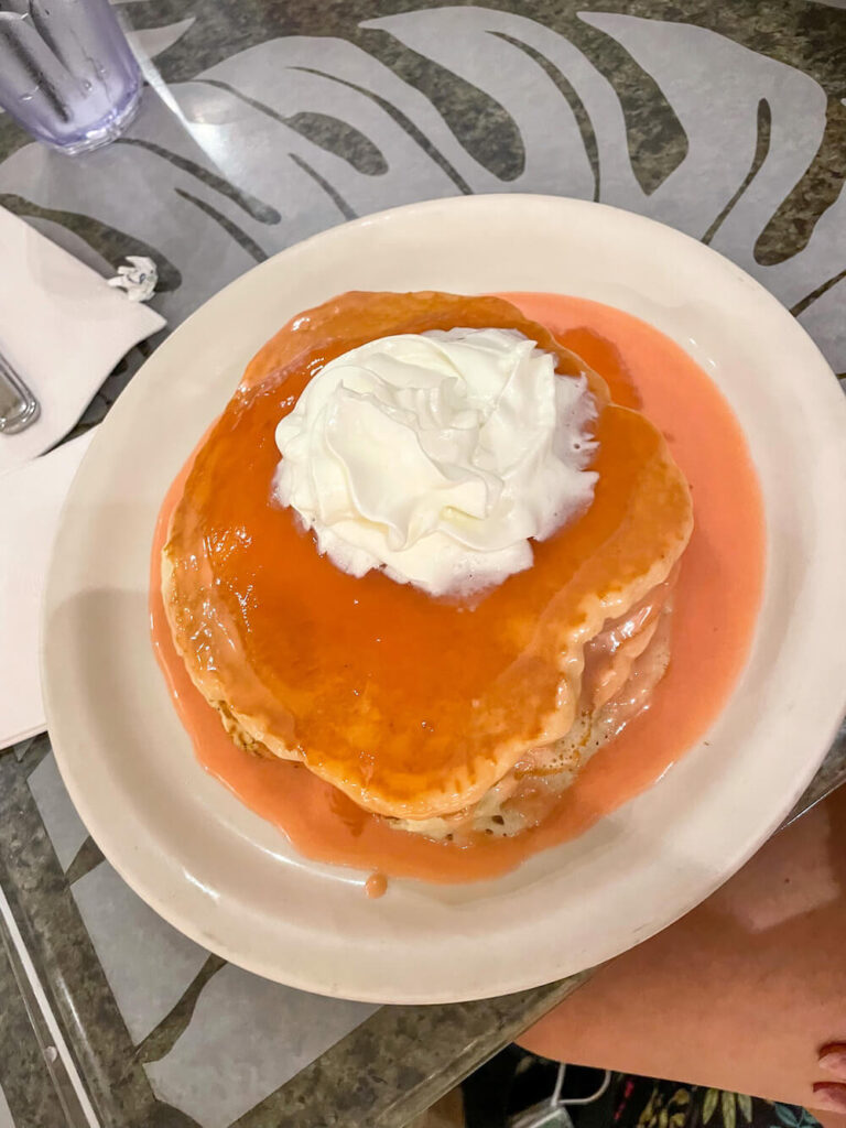 Image of a plate with pink pancakes