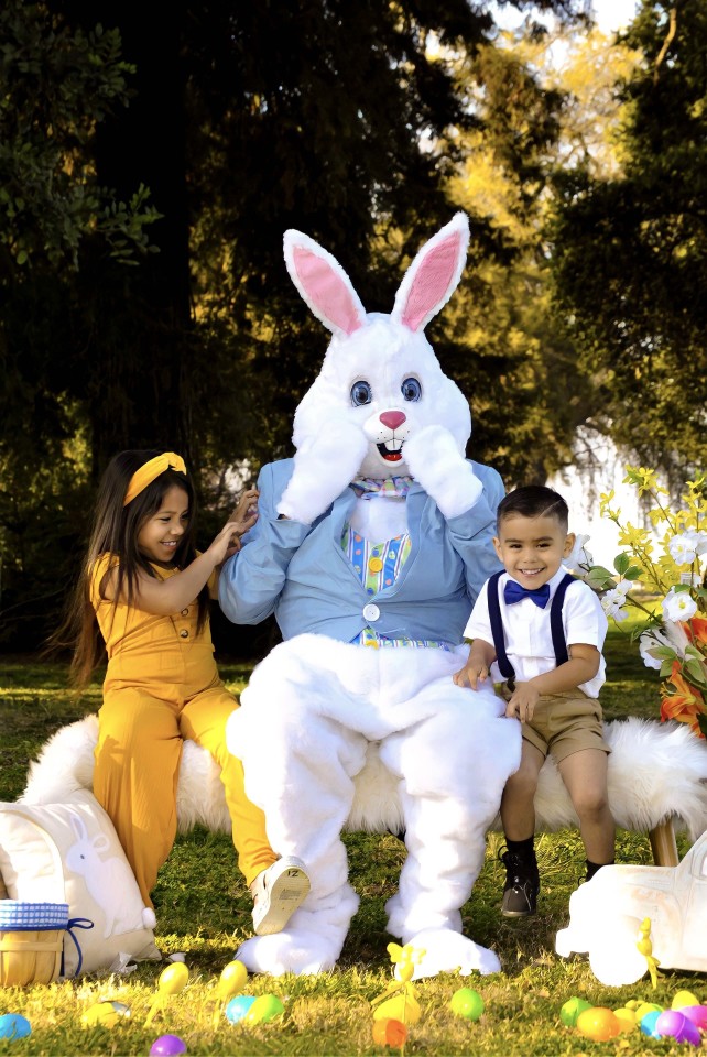 Image of kids posing for pictures with the Easter Bunny