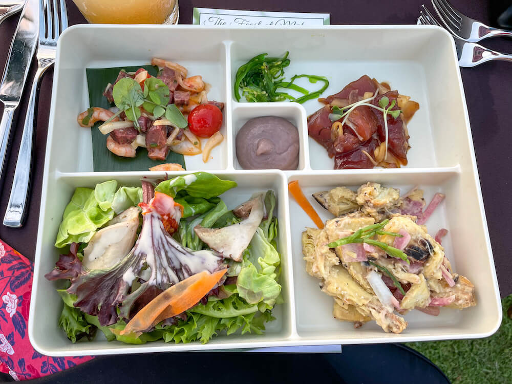 Image of a sectioned tray with lots of Hawaiian food.