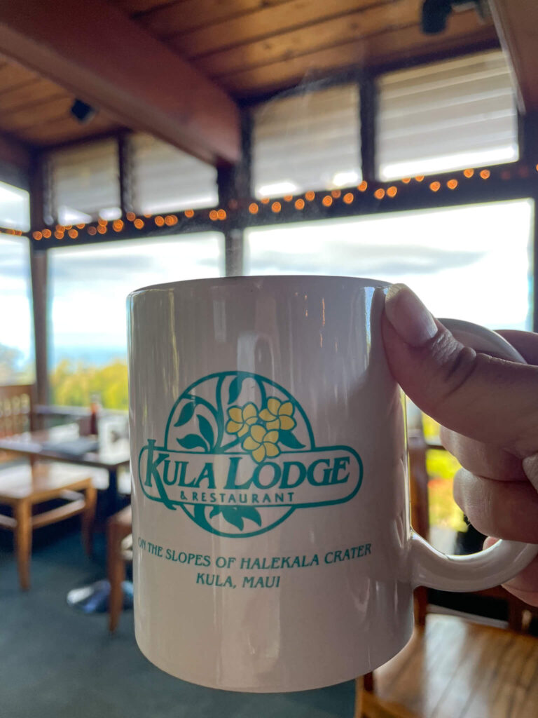 Image of a Kula Lodge branded coffee mug.