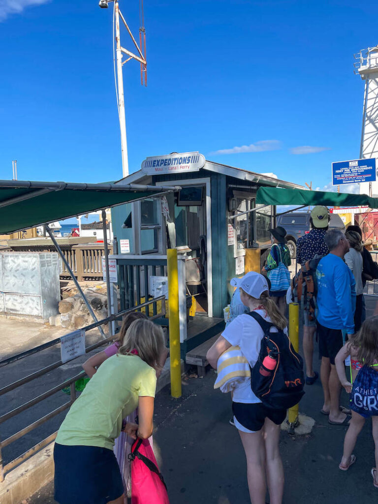 Image of people waiting in line to board the Lanai Ferry in Maui.