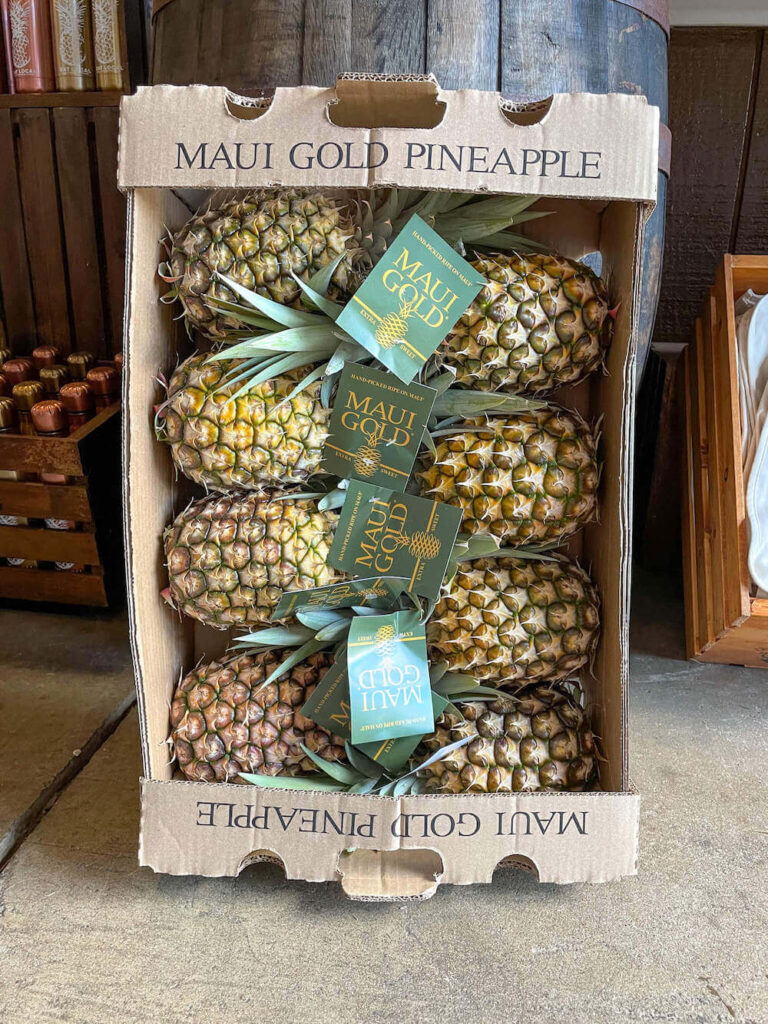 Image of a box of Maui Gold pineapples inside the gift shop at a Maui pineapple farm