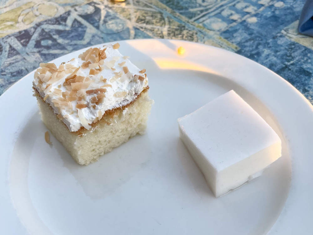 Image of a square piece of coconut cake and coconut jelly.