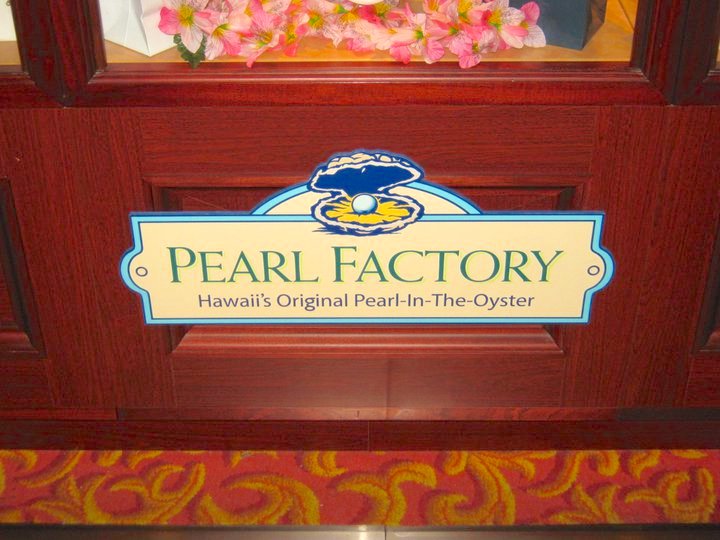 Image of the Pearl Factory sign on the NCL ship.