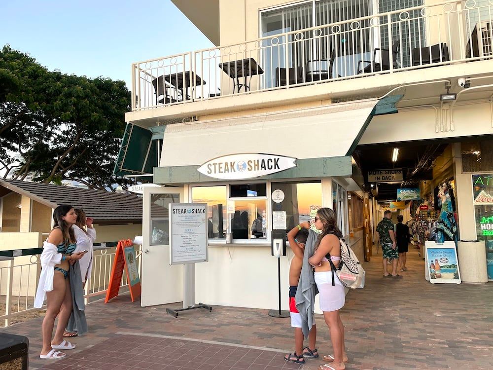 Image of the Steak Shack walk up window in Waikiki.