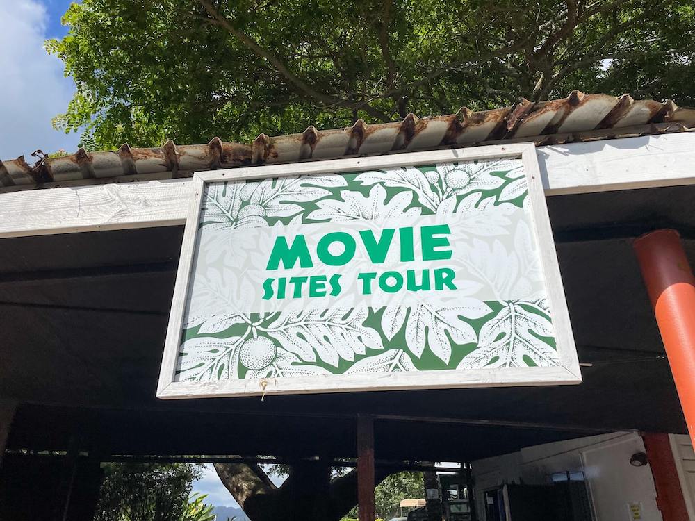 Image of the Movie Sites Tour sign at Kualoa Ranch on Oahu.