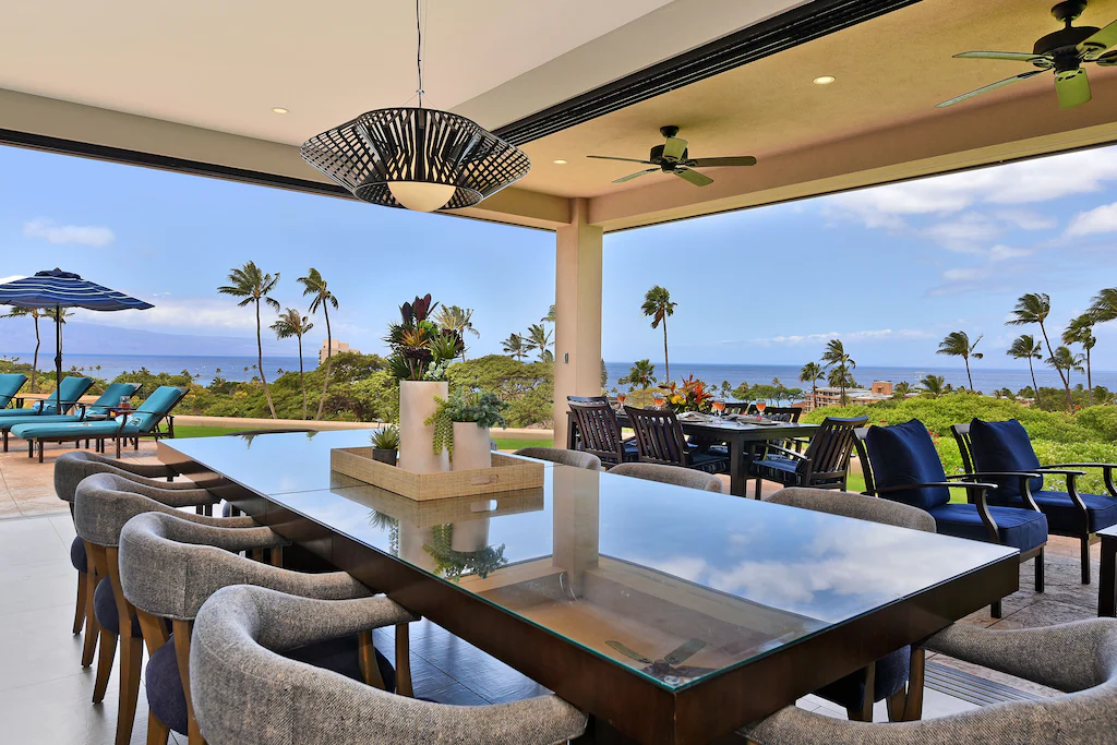 Image of a dining room with open air overlooking the Kaanapali Golf Course in Maui