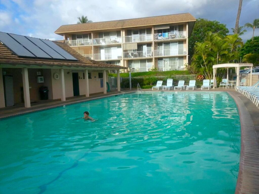 Image of a pool in front of a condo