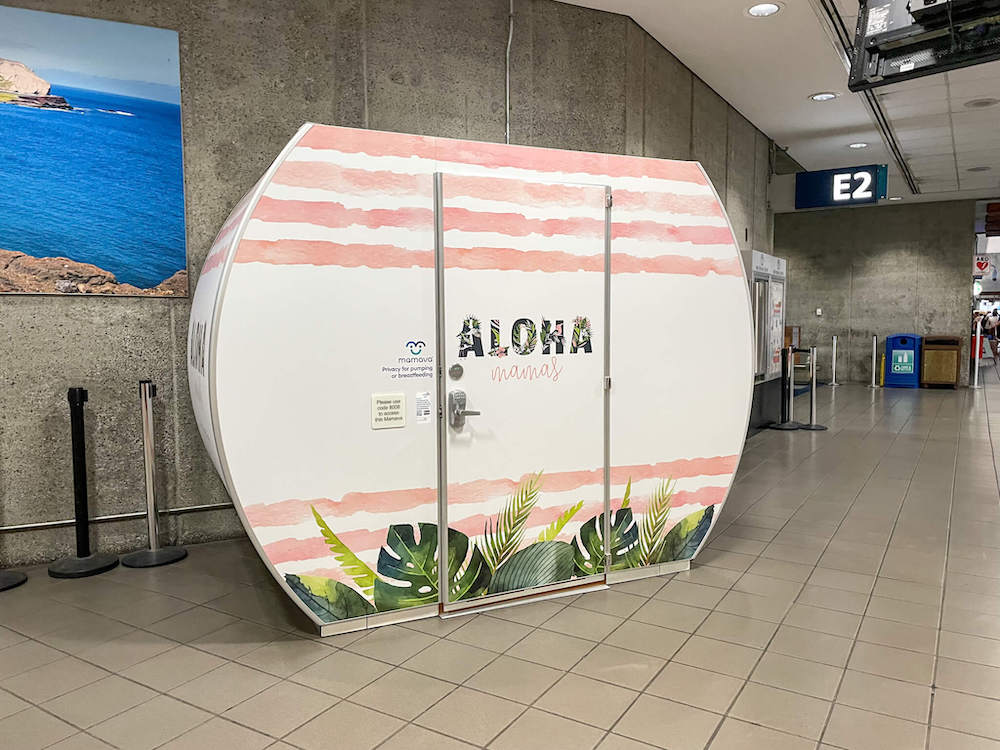 Image of a pink and white nursing pod that says Aloha Mamas on it